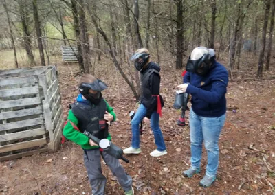 Paintball players checking their markers at Cousins Paintball in Virginia