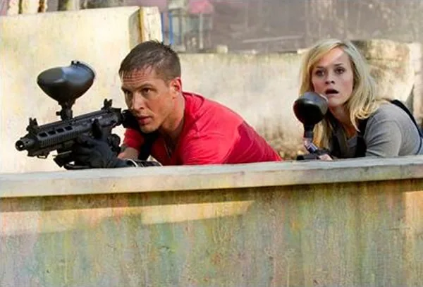 Tom Hardy and Reese Witherspoon playing paintball in "This Means War" movie. 